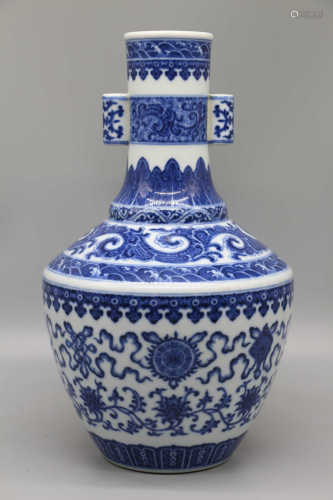 Qing Dynasty Qianlong blue and white eight auspicious patterns Guan ear bottle