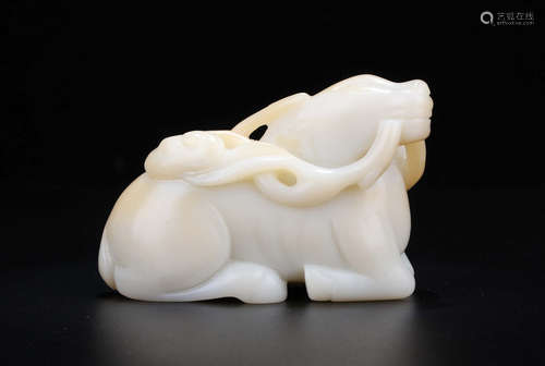 A WHITE JADE FULUSHOU ORNAMENT