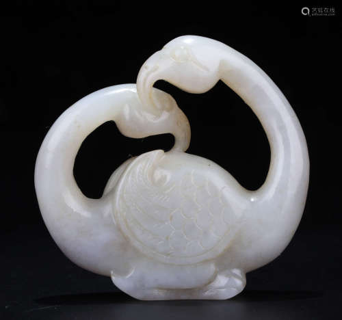 A HETIAN SHAPED DOUBLE-HUAN SHAPED ORNAMENT