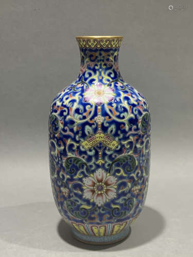 Qing Yong blue ground pink precious flower pattern bottle