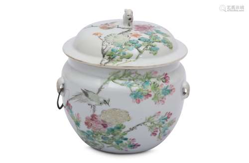 A CHINESE FAMILLE ROSE JAR AND COVER.