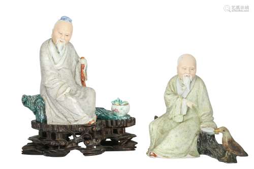 TWO CHINESE FAMILLE ROSE SCHOLAR FIGURES.