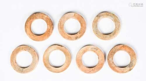 A Group of Seven Archaistic Jade Rings