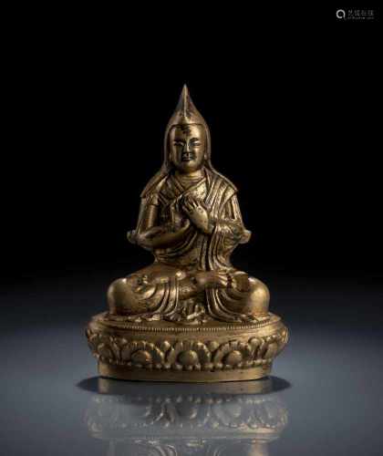 Bronze eines Lama auf einem Lotos im Meditationssitz