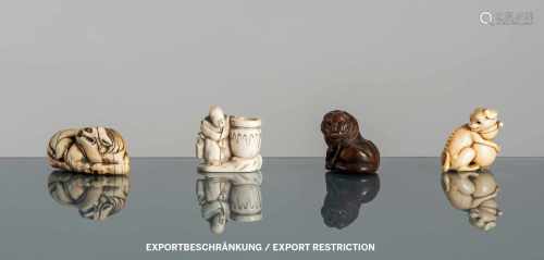 Vier Netsuke aus Elfenbein bzw. Holz: Shojo, Hündchen, Shishi und Tiger