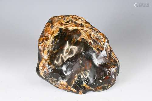 A Butterscotch Amber Stone Boulder