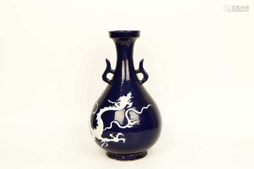 BLUE AND WHITE RESERVE DECORATED VASE