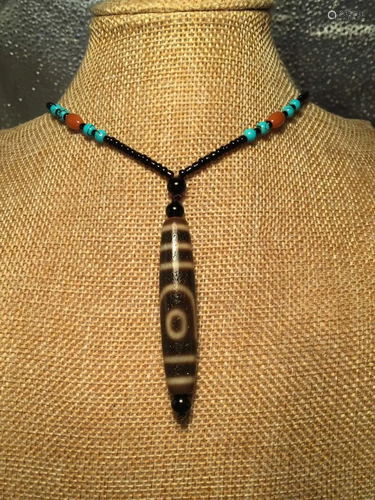 A TWO-EYE DZI BEAD