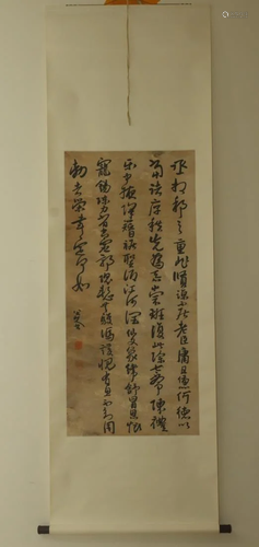 A CHINESE CALLIGRAPHY HANGING …