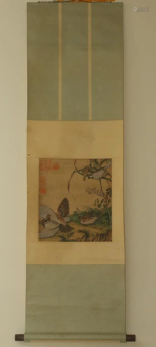 A SILK SCROLL PAINTING OF BIRDS & FL…