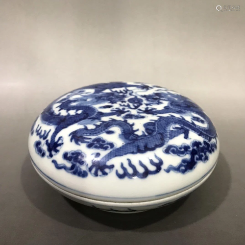 A BLUE AND WHITE 'DRAGON' PORCELAIN TR…