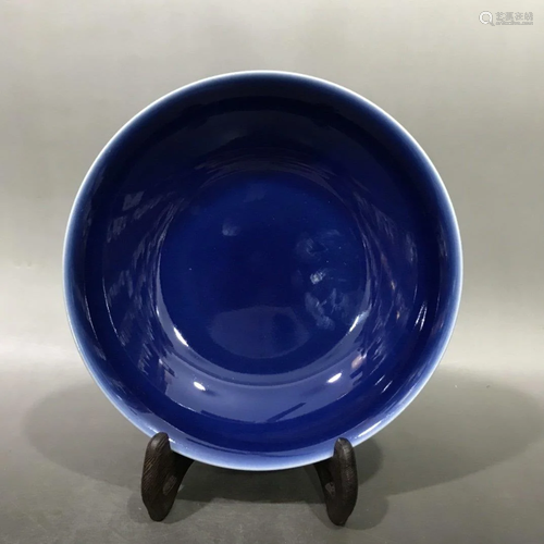 A MONOCHROME BLUE GLAZED PORCELAIN…