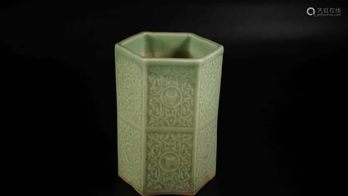 A CELADON GLAZED HEXAGON PORC…