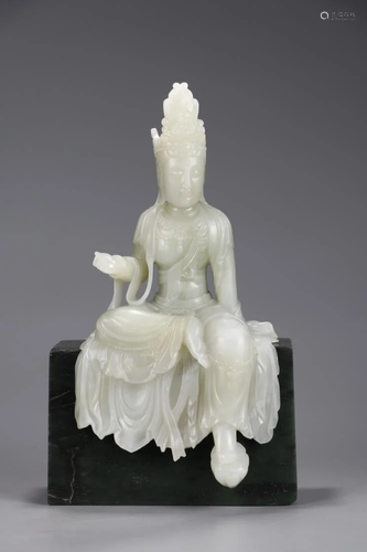 A WHITE JADE CARVING OF AVALOKITES…