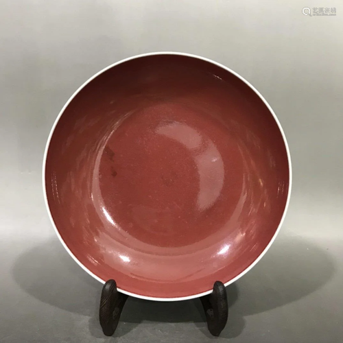 A MONOCHROME RED GLAZED PORCELAIN …