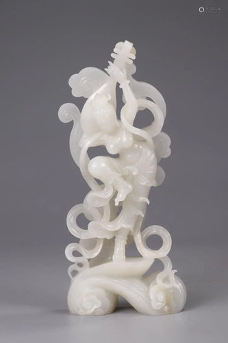 A WHITE JADE CARVING 'FLYING DANC…