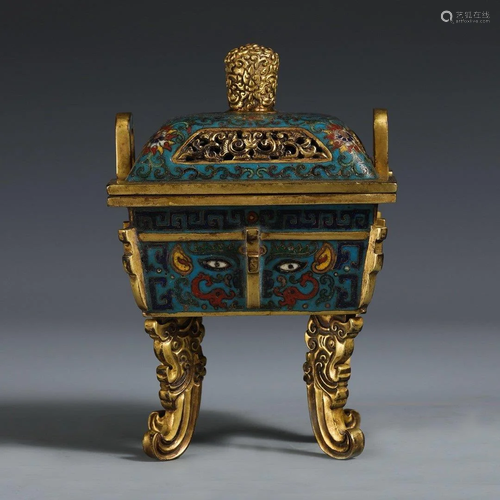 A GILT BRONZE CLOISONNE 'BEAST MAS…