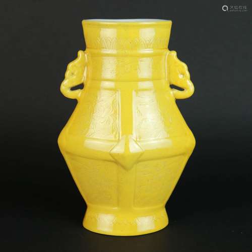 A Yellow Glaze Carved Porcelain Trunk Ears Zun