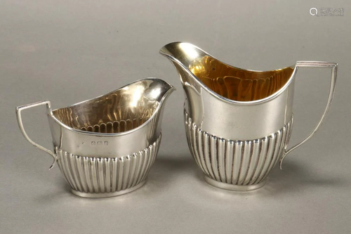 Two English Sterling Silver Creamers,