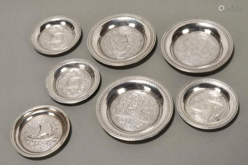 Four Egyptian Silver Coasters,