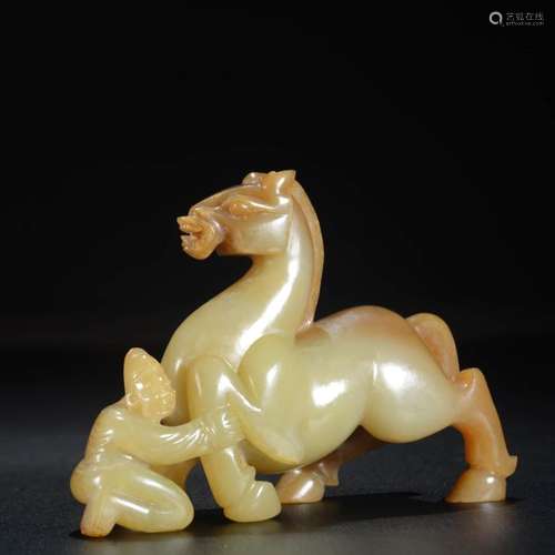 A Hetian Jade Carved Figure and Beast Ornament