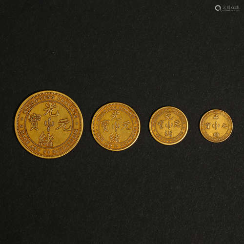 A SET OF CHINESE QING DYNASTY GUANGXU PURE GOLD COINS