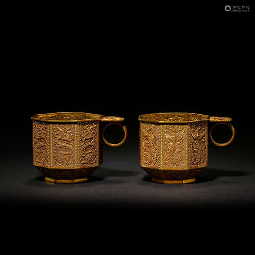 A PAIR OF CHINESE MING DYNASTY GILT SILVER CUPS