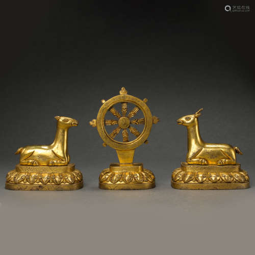 A SET OF GILT BRONZE TRIBUTE FROM THE QING DYNASTY IN CHINA