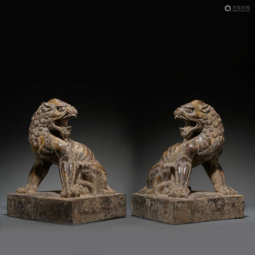 A PAIR OF ANCIENT CHINESE BLUESTONE CARVED LIONS