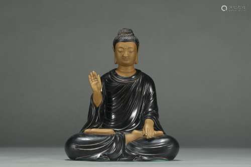 A Daqing-Qianlong-Nianzhi Mark Black Glazed Gilt Gautama Buddha Statue