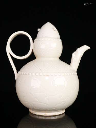 A Ding Kiln White Porcelain Floral Gourd Shaped Teapot