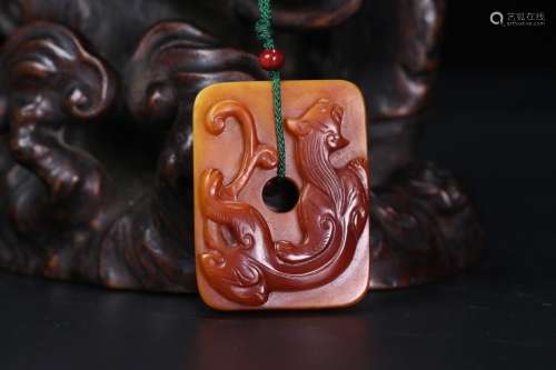 A Chinese Yellow Jade Dragon Carved Pendant