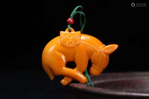 A Chinese Yellow Jade Horse Shaped Pendant