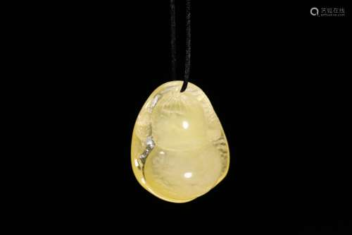 A Chinese Amber Gourd Shaped Pendant