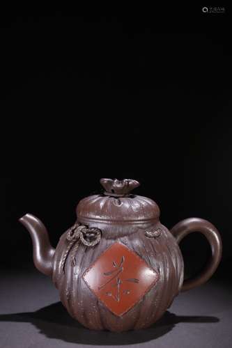 A Chinese Zisha Teapot With Pattern