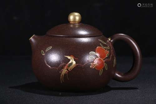 A Chinese Zisha Teapot With Auspicious Pattern And Gilding