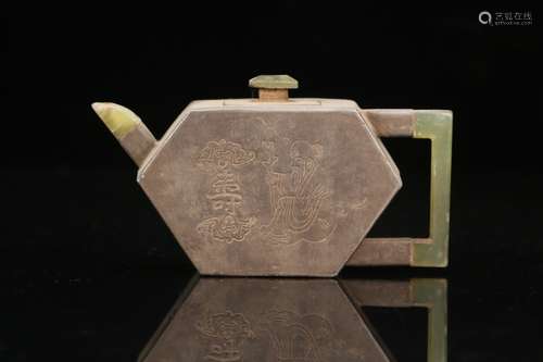 A Chinese Zisha Teapot With Longevous Pattern