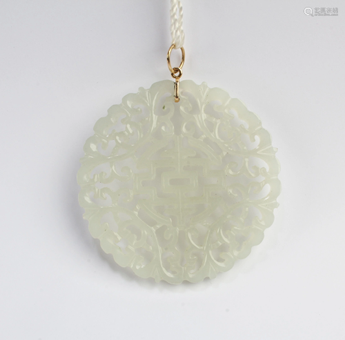 A Carved Jade Open Artwork Pendant