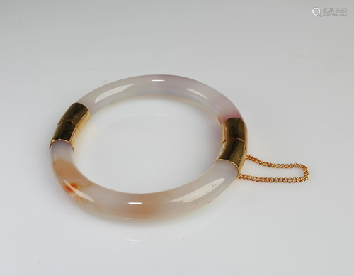 An Agate Bangle with Gold Casing