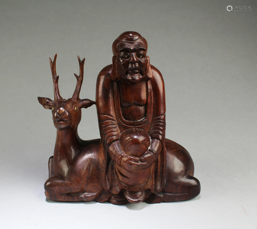 A Carved Wooden Figurine