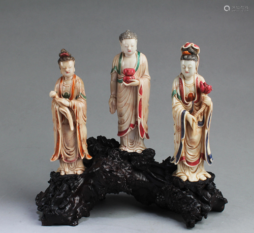 A Group of Three Soapstone Statues