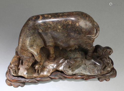 A Carved Soapstone Pig Ornament