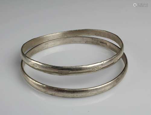 A Pair of Silver Bracelets