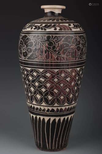 A Black-glazed Vase Carved with Peony and Money Design on White Ground, Cizhou Kiln