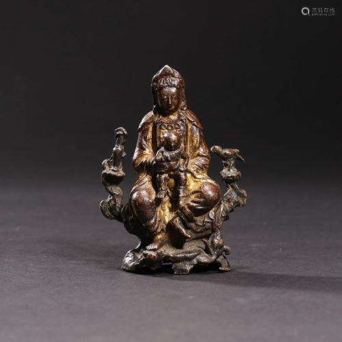 A GILT BRONZE GIVING SONS GUAN YIN STATUE