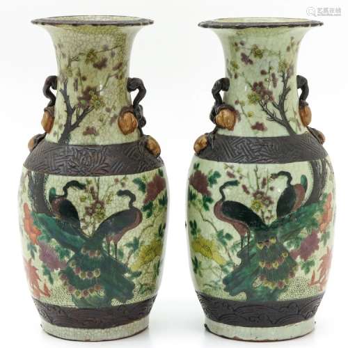 the Qing dynasty     A pair of famille rose bottles