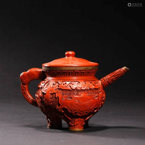 A CARVED LACQUERWARE BEAST TEAPOT