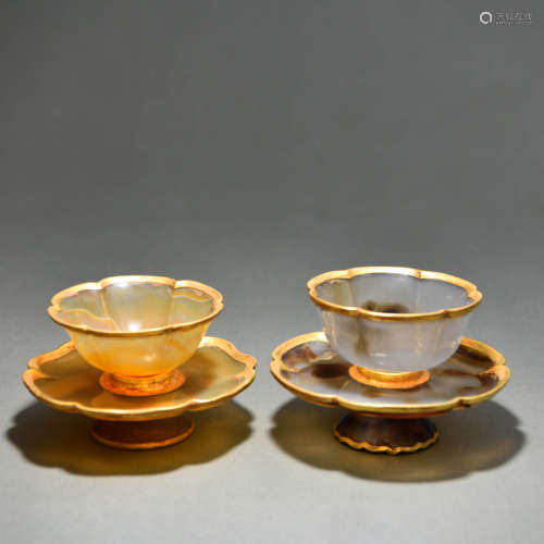 A Pair of Gold Mouth Agate Cups and Saucers