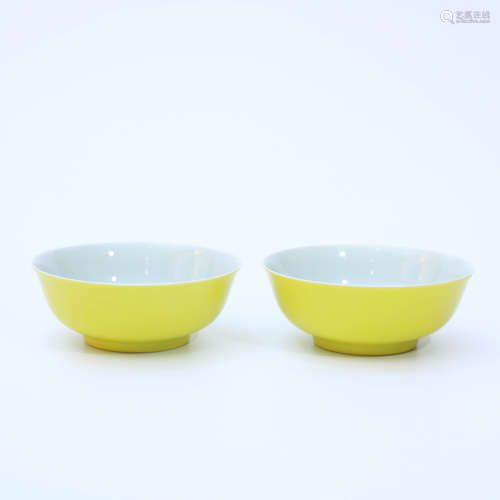 A Pair Of Lemon Yellow Enamelled Porcelain Plates