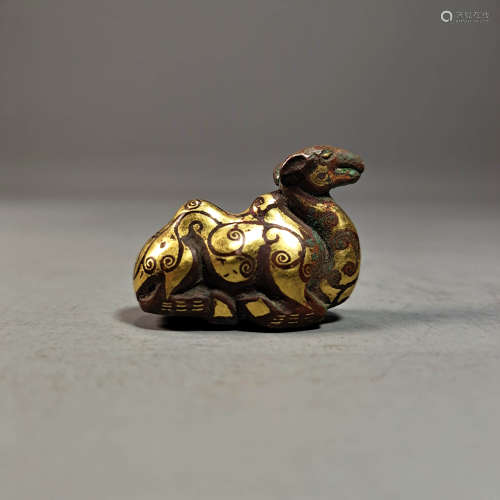 A Bronze Gold Inlaid Camel Ornament